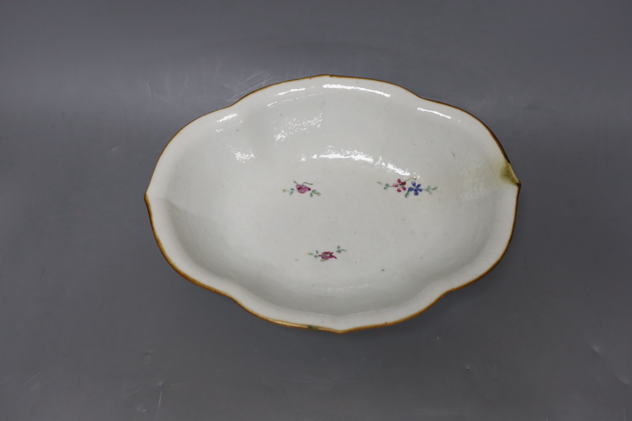 A Chinese inscribed famille rose footed dish, mid 19th century, 28cm long